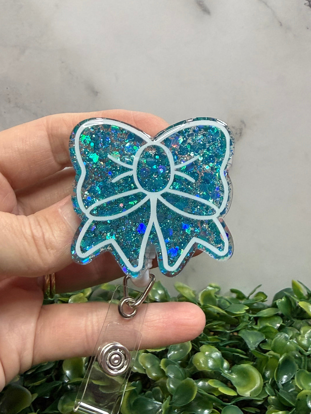 Teal Glitter Bow Badge Reel 💙